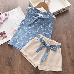 Item Type: Clothing Set Gender: Girls Material: Cotton, Polyester Sleeve: Short Closure Type: No Collar: Round Package Includes: 2 x Pcs Size Info: Size Length (cm / inch) Skirt Length (cm / inch) 2T/90 39 / 15.35 33 / 12.99 3T/100 40 / 15.75 33 / 12.99 4T/110 41 / 16.14 34 / 13.39 5T/120 42 / 16.54 34 / 13.39 6T/130 45 / 17.72 34 / 13.39 Floral Chiffon Top, Print Outerwear, 여름 스타일, Bow Shorts, Chiffon Floral, Design Girl, Summer Prints, Embroidered Shorts