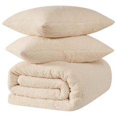 three pillows stacked on top of each other