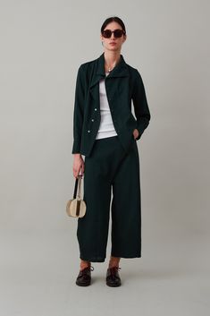 The Morgan Pant features a slightly dropped crotch, rounded seams at the leg, and kangaroo pockets. With a back zipper closure at the waist, the Morgan Pant should fit high and snug on the waist and generous through hips and legs. High-waisted Pantsuit With Pockets For Fall, Fall Wide-leg Pantsuit With Pockets, Fall Pantsuit With Welt Pockets And Ankle-length Pants, Casual Pantsuit With Wide-leg Pants And Pockets, Fall Ankle-length Pantsuit With Welt Pockets, Fall Pantsuit With Tapered Leg And Pockets, Fall Tapered Leg Pantsuit With Pockets, Casual Pantsuit With Pockets And Straight Pants, Casual Pantsuit With Pockets