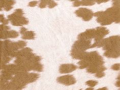 an animal skin pattern with brown and white spots