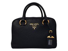 This classic Prada satchel bag is the perfect choice for an everyday look. The handbag is crafted with pebbled leather and features gold-tone hardware and the Prada logo on the front face. The two-way zipper opens to a black fabric interior with two interior pockets. The multi-colored web strap adds a unique yet elegant touch. Look no further for a luxurious wardrobe staple by Prada.    Model number: 1BB086  Color: Nero  Vitello Phenix calfskin leather  Gold-tone hardware  Two-way zipper fasteni Luxurious Wardrobe, Pebbled Leather, Black Fabric, Satchel Bags, Wardrobe Staples, Everyday Look, Calf Skin, Prada, Satchel