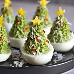 deviled eggs decorated as christmas trees on a plate