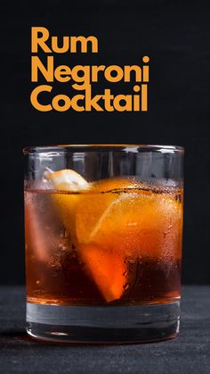 rum negroi cocktail in a glass with an orange slice on the rim and text that reads rum negroi cocktail