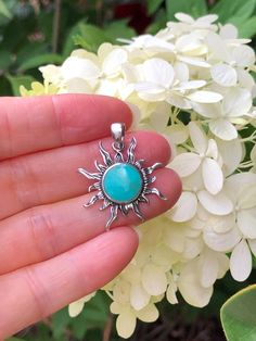 925 Sterling Silver Turquoise Sunburst Pendant - Metal: 925 Sterling Silver - Stone: Lab-Created/Synthetic Turquoise - Shape: Sunburst - Pendant Dimension:  Total Height includes Pendant Bail: 29mm(1.14 in); Pendant Bail's Inner Size: about 5mm x 3.5mm; Sunburst: 24mm(0.94 in), Thickness 2mm/0.9mm.  (Turquoise Stone: 11mm/0.43 in x 2mm.) (Please note that 24mm/0.94" is measured from point to point. Because of slim pointed shape, the actual pendant looks SMALLER.)   Color: Silver Turquoise Round Spiritual Jewelry, Turquoise Gemstone Round Stone Jewelry, Turquoise Gemstone Jewelry With Round Stone, Nickel-free Larimar Silver Jewelry, Handmade Turquoise Larimar Jewelry, Spiritual Round Larimar Jewelry, Spiritual Turquoise Jewelry Stamped 925, Silver Amazonite Round Jewelry, Silver Larimar Jewelry For Healing