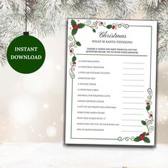 a printable christmas wish - list with holly and berries on it, next to a green ornament