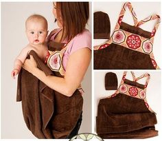 a woman holding a baby in a brown carrier