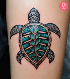 a turtle tattoo on the side of a woman's leg with an intricate design