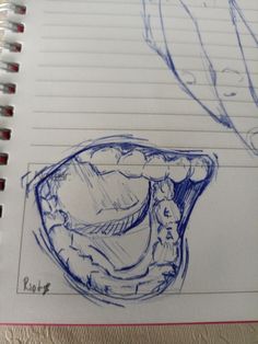 a drawing of an open mouth with the teeth still attached to it's sides