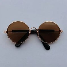 a pair of sunglasses sitting on top of a table