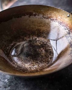 a frying pan with some brown stuff in it