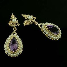 Amethyst Pearls Earrings Chandelier Dangle Earring Victorian Style Gold Gemstone Cultured Pear Victorian style amethyst (Approx. 8ct) and pearl drop earrings 14kt yellow gold with post backs and cultured pearls strung on a gold wire. Earrings are 40mm long (1.6inch), 16 mm wide (0.6 inch). This style is also available in white gold and a variety of other gems such as: Citrine, Amethyst, Garnet and Peridot. Please contact us if you are interested in any of these options. PROUDLY MADE FROM SCRATCH Purple Drop Chandelier Earrings For Formal Occasions, Classic Chandelier Dangle Earrings With 17 Jewels, Elegant Amethyst Earrings For Formal Occasions, Formal Pear-shaped Chandelier Earrings, Elegant Dangle Gemstone Cluster Earrings, Elegant Dangle Cluster Earrings With Gemstones, Elegant Amethyst Earrings, Elegant Purple Dangle Clip-on Earrings, Exquisite Gemstone Dangle Earrings