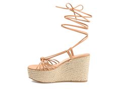 With the Catalinn by Journee Collection, you can bring on the summer vibes. The multi-straps on this tie-up shoe are guaranteed to brighten up your day. Soft vegan leather uppers, a 4 mm Tru Comfort Foam™ footbed, and an espadrille-wrapped platform heel add texture to the design. Luxe Vegan Leather upper, Dainty ankle wrap tie-up design, Approx. 4\ espadrille wrapped platform / wedge, Open Soft Square toe, Tru Comfort Foam™ footbed, Man-made outsole, Caged multi-strap design with knotted detail Summer Lace-up Sandals With Strap And Round Toe, Strapped Synthetic Sandals For Summer, Spring Leather Strapped Lace-up Sandals, Strapped Lace-up Sandals For Beach In Summer, Strapped Lace-up Sandals For Summer Beach, Strapped Sandals For Spring Vacation, Strapped Sandals For Vacation In Spring, Strapped Lace-up Sandals For Summer Vacation, Summer Strapped Leather Lace-up Sandals