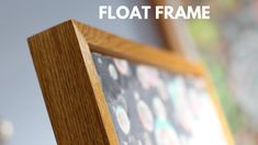 a close up of a wooden frame with the word float frame in front of it