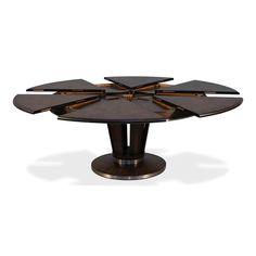 an art deco style dining table with four leaves on the top and two circular bases