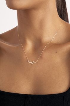 Gelin Diamond 14k Gold Heartbeat Necklace on a model's neck. Heartbeat Necklace, Love And Connection, 14k Gold Necklace, Gold Necklaces, Cool Pictures Of Nature, In A Heartbeat