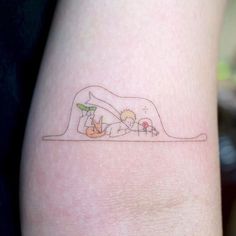 a person with a small tattoo on their leg