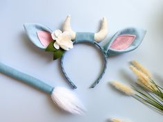 "LIGHT BLUE OX HEADBAND with or without FLOWERS: LIGHT BLUE TAIL with clip: (This is the LIGHT BLUE VERSION - For a medium blue or turquoise version please see the other ox headband options in shop- see OX section.) Choose your headband option upon checkout: -Ox Headband + Flowers -Ox Headband -no flowers/plain -No Headband/Tail only Also choose tail size: -Small: 6.5\" -Medium: 11\" -Large: 19\" VERSION WITHOUT FLOWERS ALSO AVAILABLE IN SHOP (Tail sizes are approximate and do not include the metal clip in the estimation) This size headband will fit either child or adult. Order one or multiple. (Baby versions are also available - just send me a private message for this particular one with flowers - version without flowers is already in the shop with its own listing). More cow, ox, goat and Cute Blue Headband Hair Accessories, Blue Hair Accessories With Matching Headband For Spring, Cute Blue Party Hair Accessories, Cute Blue Hair Accessories For Party, Handmade Blue Headband Hair Accessories, Blue Handmade Headband Hair Accessories, Handmade Blue Headband, Cute Blue Adjustable Hair Accessories, Cute Adjustable Blue Hair Accessories