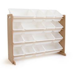 a wooden shelf with white bins on it