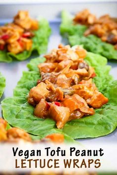 vegan tofu peanut lettuce wraps on a tray with text overlay