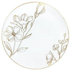 a white and gold plate with flowers on it