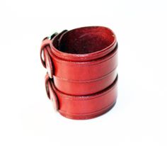 Unique red leather bracelet! Very comfortable & easy to wear. Size: Wirst size: 6-8.5 inches(16-22cm) Width: 2.55 inch (6.5 cm) Color: red. Material: genuine leather(leather is produced in Italy). If you have any questions please write! Classic Leather Bracelet With Wrist Strap, Classic Leather Bracelet With Wrist Strap As Gift, Adjustable Red Leather Bracelet, Handmade Red Leather Bracelet, Red Leather Bracelet As Gift, Red Leather Bracelet For Gift, Red Adjustable Leather Bracelet, Adjustable Red Cuff Bracelet As Gift, Leather Strap Cuff Bracelet Gift