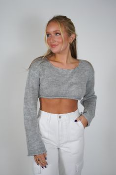 Get ready to rock this Tammy Crop Sweater! With its bell sleeves and cropped design, this sweater is perfect for adding a touch of quirkiness to any outfit. Stay stylish and comfortable with this must-have addition to your wardrobe. Size + Fit Anna is 5'8" and wearing a size Small Content + Care 100% Acrylic Hand Wash Cold Color Separate Outerwear Vest, Crop Sweater, Crop Top Sweater, Little White Dresses, Vacation Dresses, Active Wear Outfits, Matching Dresses, Dress Romper, Cropped Sweater