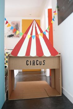 a cardboard circus tent with the word circus on it