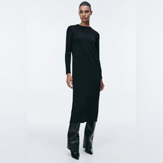 Long Dress With Round Neck And Long Sleeves. Rib Trim. Color: Black | 5536/130 New With Tags Casual Long Midi Dress For Evening, Black Stretch Midi Sweater Dress, Black Long Sweater Dress For Spring, Black Midi Length Sweater Dress For Work, Black Sheath Dress For Fall, Black Long Daywear Dresses, Long Black Daywear Dress, Chic Long Black Bodycon Dress, Sleek Dresses For Daywear In Fall