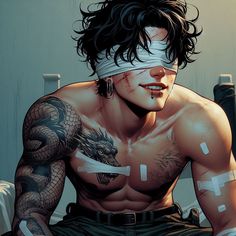 a man with tattoos and bandages on his face is sitting in front of a wall