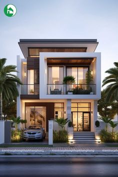 an image of a modern house at night with palm trees and cars parked in front