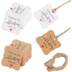 four tags with string attached to them that say thank you for celebrating