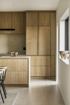 the kitchen is clean and ready to be used as a dining room or living area