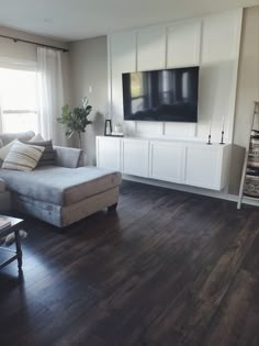 the living room is clean and ready to be used as a home theater or entertainment center