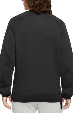 Lightweight Tech Fleece brings softness and warmth without added bulk to a layerable sweatshirt that's perfect for working out, going out or just hanging out. 27 1/2" length (size Medium Regular) Crewneck 53% cotton, 47% polyester Machine wash, dry flat Imported Nike Black Casual Fleece Jacket, Functional Black Long Sleeve Sweatshirt, Nike Black Activewear With Ribbed Cuffs, Nike Fall Crew Neck Activewear, Functional Fleece Crew Neck Sweatshirt, Functional Fleece Sweatshirt, Black Sportswear Sweater With Ribbed Cuffs, Black Fleece Sweats For Fall, Nike Long Sleeve Sweatshirt With Fleece Lining