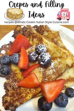 french toast with strawberries and blueberries on top, topped with powdered sugar