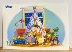 an image of cartoon characters in front of a christmas tree with balloons and decorations on it