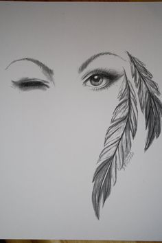 a pencil drawing of an eye with feathers on the side and eyelashes in the middle