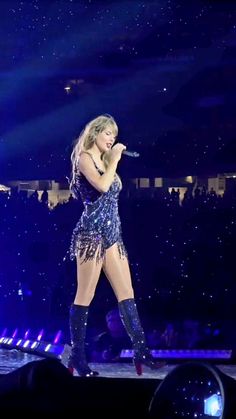 taylor swift performs on stage at the super bowl