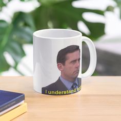 a white coffee mug with the words i understand you on it and a man's face