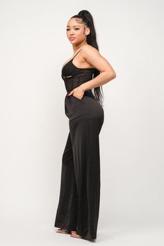 Get ready to stun in our Women's Spider Mesh Top Jumpsuit! This sleek and stylish jumpsuit features a unique spider mesh top that adds a touch of edginess to your outfit. Perfect for a night out or special occasion, this jumpsuit is sure to turn heads. Step out in confidence and style with our Women's Spider Mesh Top Jumpsuit. - 97% POLYESTER 3% SPANDEX Chic Bodysuit With Built-in Bra For Night Out, Chic Bodysuit With Built-in Bra For Evening, Sleeveless Black Bodysuit With Lace Closure, Flirty Sleeveless Jumpsuits And Rompers For Evening, Chic Stretch Jumpsuit With Lined Body, Elegant Black Jumpsuits And Rompers With Lined Body, Chic Sleeveless Bodysuit With Lace Closure, Chic Stretch Jumpsuits And Rompers With Lined Body, Flirty Sleeveless Jumpsuits For Evening