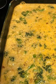 a casserole dish with broccoli and cheese