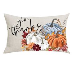 a decorative pillow with the words give thanks on it and pumpkins in fall colors