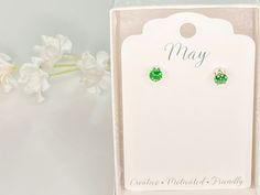 May birthstone, beautiful green cubic zirconia. Emerald birthstone earrings. 5mm round green stone hand set in 6 prong sterling silver setting. Each stone is 1/2 carat total weight. These sparkly green earrings are a perfect gift idea! These gorgeous earrings come in a gift box in an organza bag ready to be given to that special someone. Great gift idea for a birthday, an anniversary, Valentine's Day or any occasion. Great for mothers, sisters, daughters or friends! What a great personalized gif Emerald Stud Earrings, December Birthday Gifts, Emerald Birthstone, Earrings Emerald, January Birthday, Tanzanite Earrings, May Birthday, December Birthday, Emerald Earrings Studs