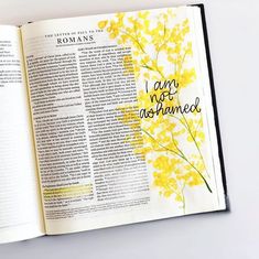 an open bible with yellow flowers and the words i am not transformed written on it