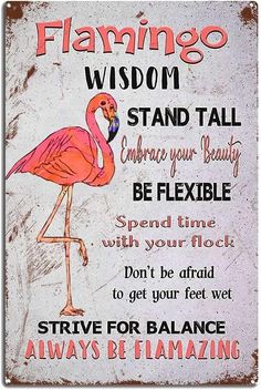 a pink flamingo standing next to a white sign with the words, flamingo wisdom stand tall be flexible spend time don't be afraid to get your feet wet