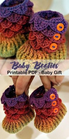 the baby booties are crocheted and have numbers on each side, as well as letters that spell out