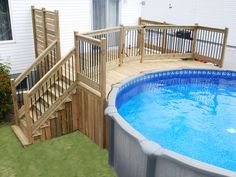 an above ground pool with steps leading to the deck