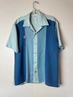 I recently picked up a handful of super nice men's shirts from the 60's.  This one is a Davinci, size large.  2 tone medium & light blue.  It's in great condition. Looks so sharp and original . No flaws noted. Recently washed & pressed, ready to wear.  Washable rayon type of knit material.  Good weight and lays nicely.  ✏️✏️✏️DETAILS✏️✏️✏️ Brand: DAVINCI Size on tag: LARGE Fits like: same Color:  Blue & light blue Material: rayon type Condition: excellent  Item includes: shirt ✂ ✂️MEASUREMENTS ✂️✂️ I measure garments laying flat from seam to seam across, then I double that measurement.  Reach out if you need more information I'm happy to share further if I can.  Chest: Waistline: Total length: Shoulders: Sleeves: Armscye:  Please read full description and ask as much info as you may need. Rockabilly Style Men, Vintage Rockabilly Style, Rockabilly Style, 1960s Mod, Rockabilly Fashion, Mens Style, Retro Shirts, Men's Shirts, Portland Oregon