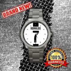 a watch with the number 1 on it is surrounded by grungy metal mesh