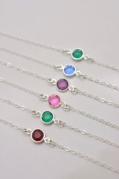 REAL STERLING SILVER CHAIN AND CLASP - A GREAT KEEPSAKE This lovely necklace is the perfect personalized gift. I make this using solid sterling silver chain and a spring clasp. The Swarovski crystal charm is available in your choice of birthstone color and measures approximately 6mm across. Comes in a gift box, perfect for gift-giving.  **SIZING - PLEASE READ: Select your necklace size at checkout. Note that necklaces will fit differently depending on a person's size. Please measure carefully. * Adjustable Sterling Silver Necklace For May Birthstone, Adjustable Sterling Silver May Birthstone Necklace, Adjustable Silver Birthstone Necklace For May, Adjustable Silver Necklace For May Birthstone, Sterling Silver Hypoallergenic May Birthstone Necklace, Silver Faceted Sterling Silver Birthstone Necklace, Hypoallergenic Sterling Silver May Birthstone Necklace, Dainty Silver Adjustable Birthstone Necklace, Adjustable Silver Birthstone Necklace